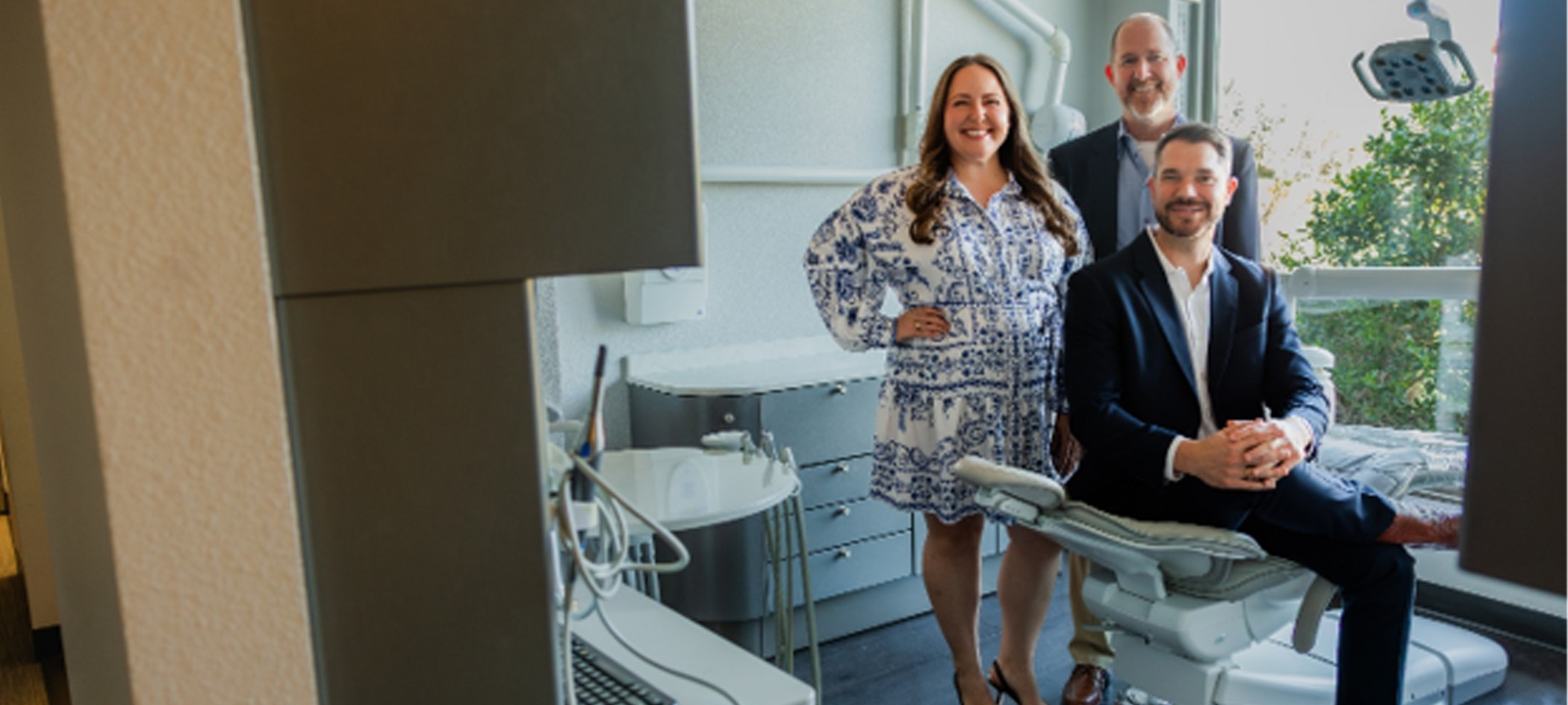 Happy, smiling team at Wright Naeger Dentistry