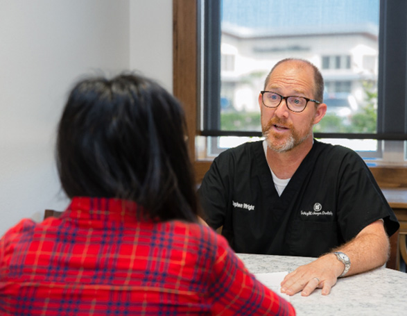 Dr. Wright speaking with patient during consultation