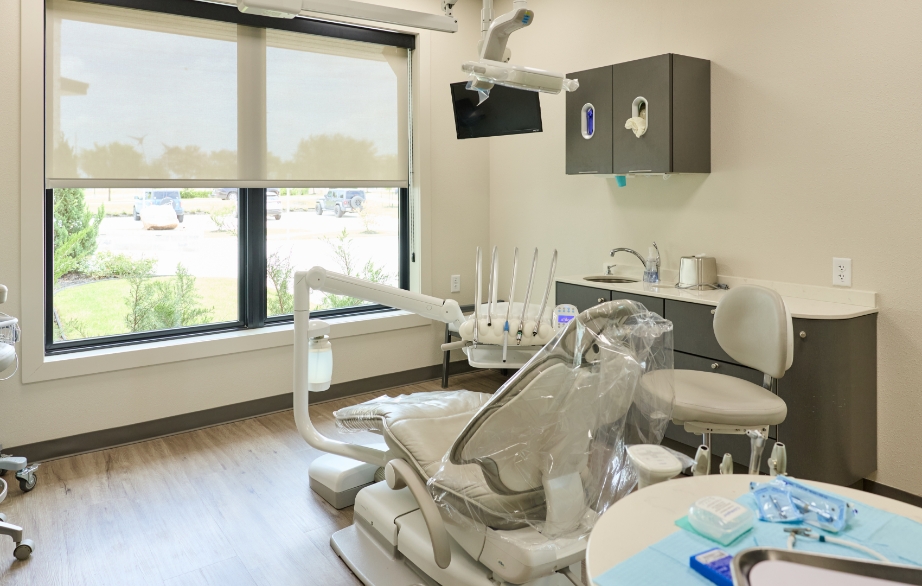 Dental scanning machine standing against a wall